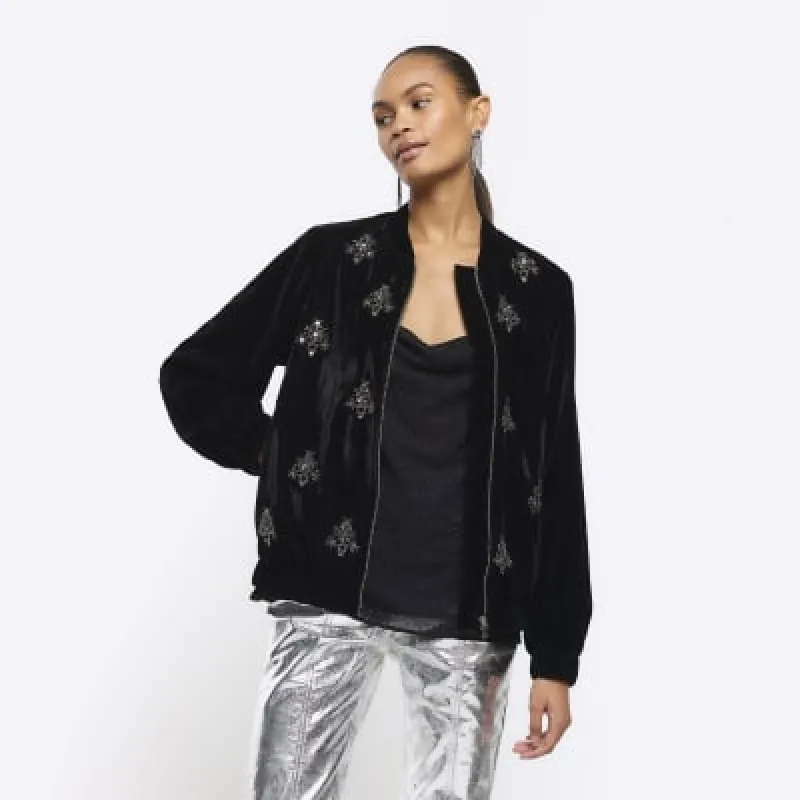 Black velvet embellished bomber jacket sold by River Island