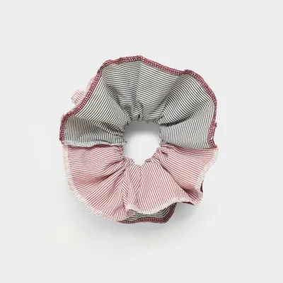 Pink mixed stripe hair scrunchie sold by River Island