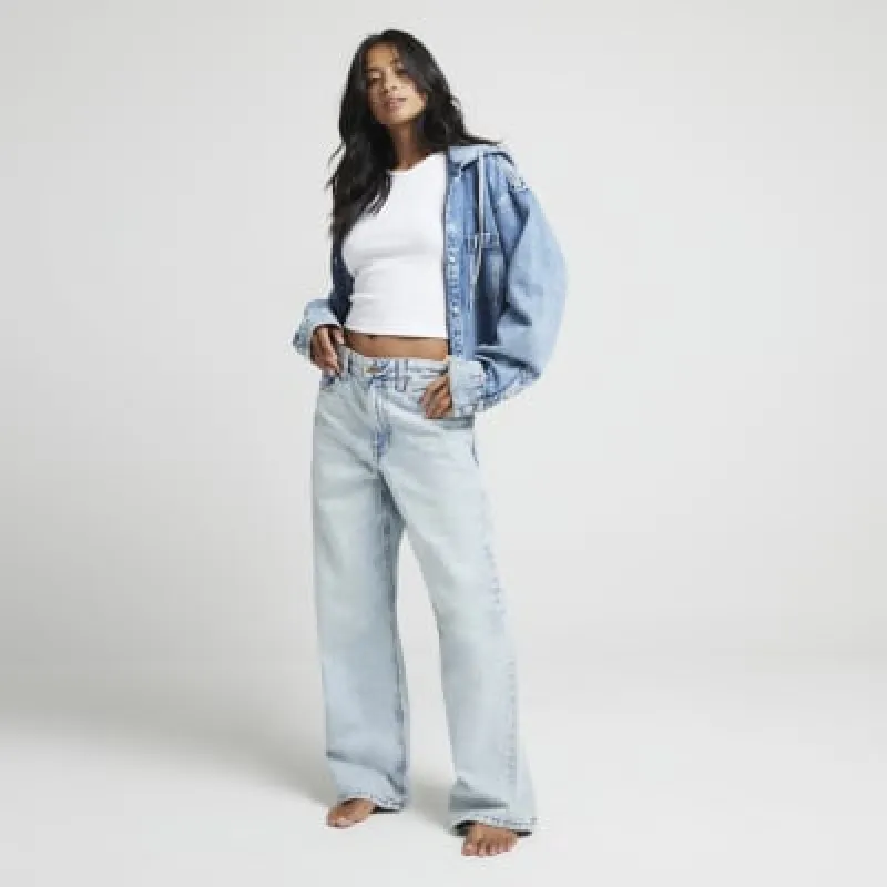 Petite blue high waisted straight jeans sold by River Island