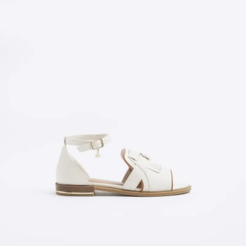 Cream peep toe flat sandals sold by River Island