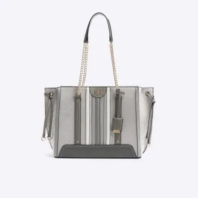 Grey embossed monogram chain tote bag sold by River Island