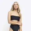 Black frill bandeau bikini top sold by River Island