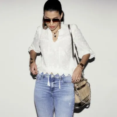 Blue mid rise Molly bum sculpt skinny jeans sold by River Island