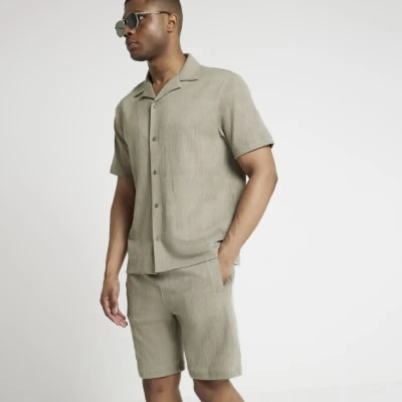 Khaki regular fit plisse shorts made by River Island