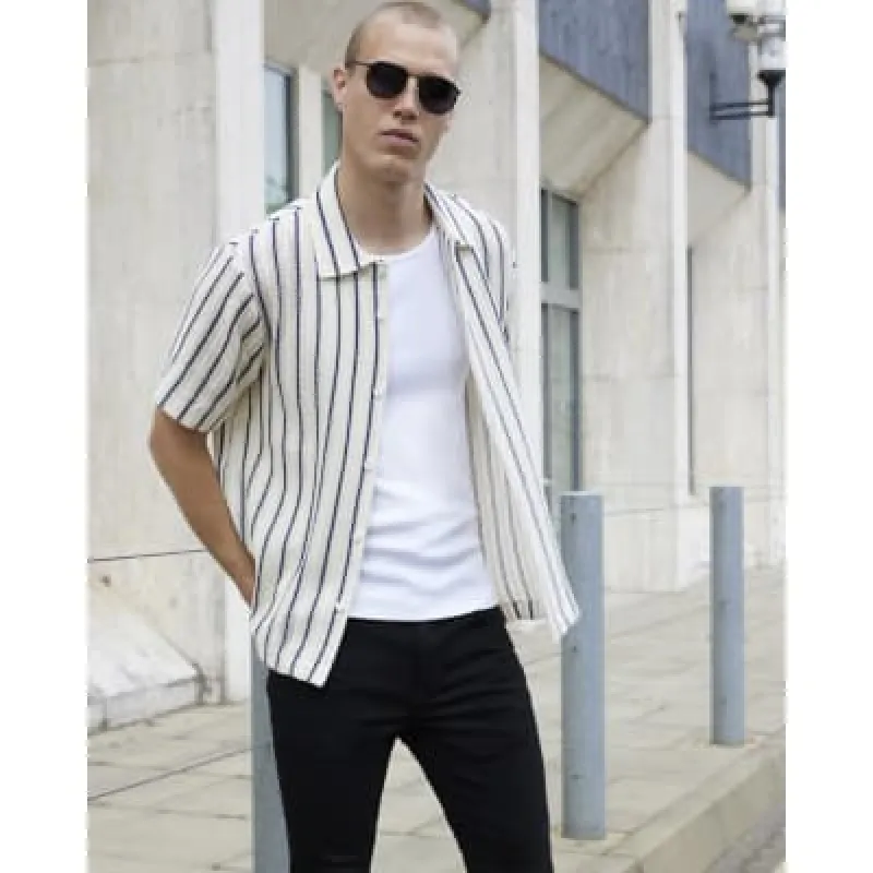 Black Spray On Skinny Jeans made by River Island