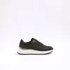 Black panelled trainers sold by River Island