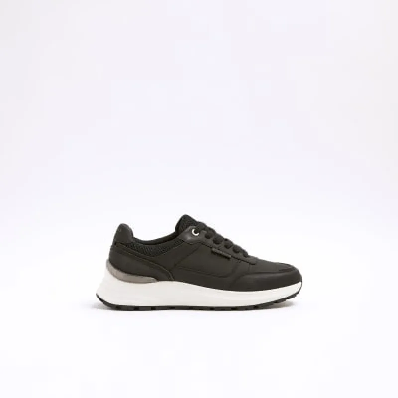 Black panelled trainers sold by River Island