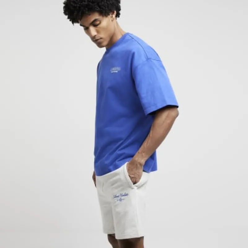 Blue oversized fit graphic print t-shirt sold by River Island