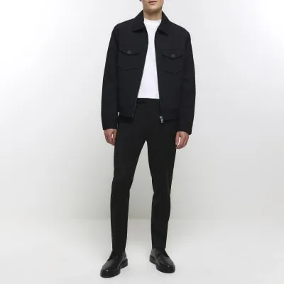 Black slim fit smart trousers sold by River Island