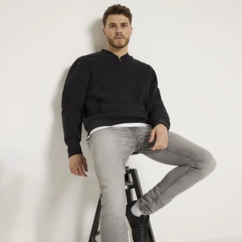 Grey spray on fit jeans made by River Island