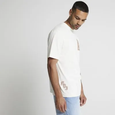 Beige regular fit graphic print t-shirt sold by River Island