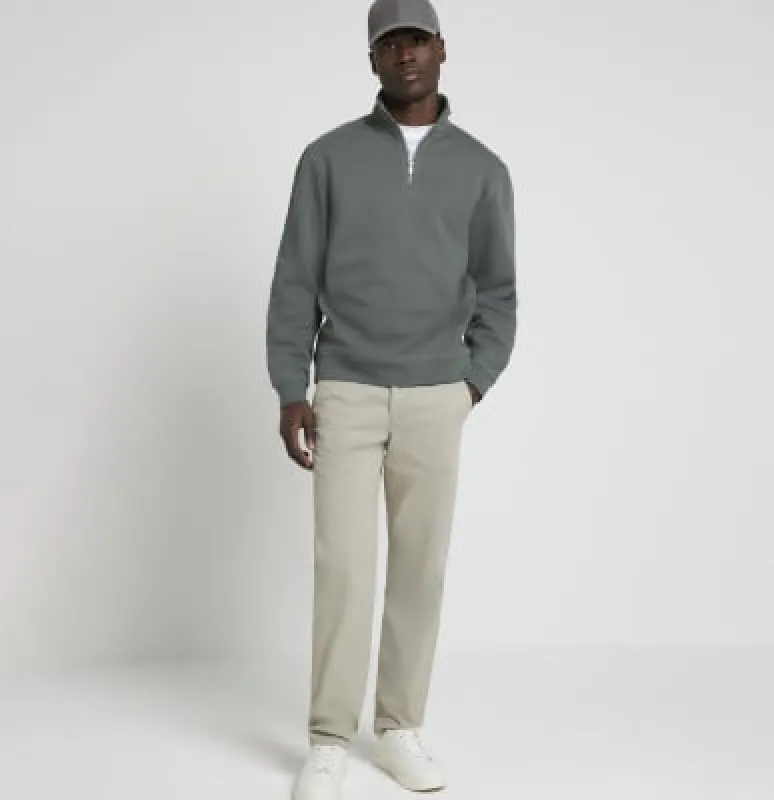 Stone slim fit casual chino trousers sold by River Island