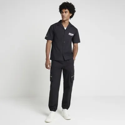 Black regular fit graphic revere shirt sold by River Island