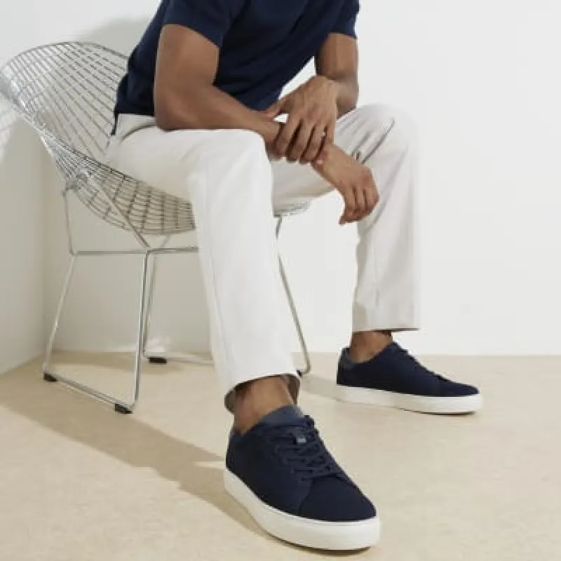 Navy knit lace up trainers sold by River Island