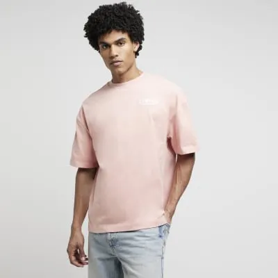 Pink oversized fit graphic print t-shirt sold by River Island