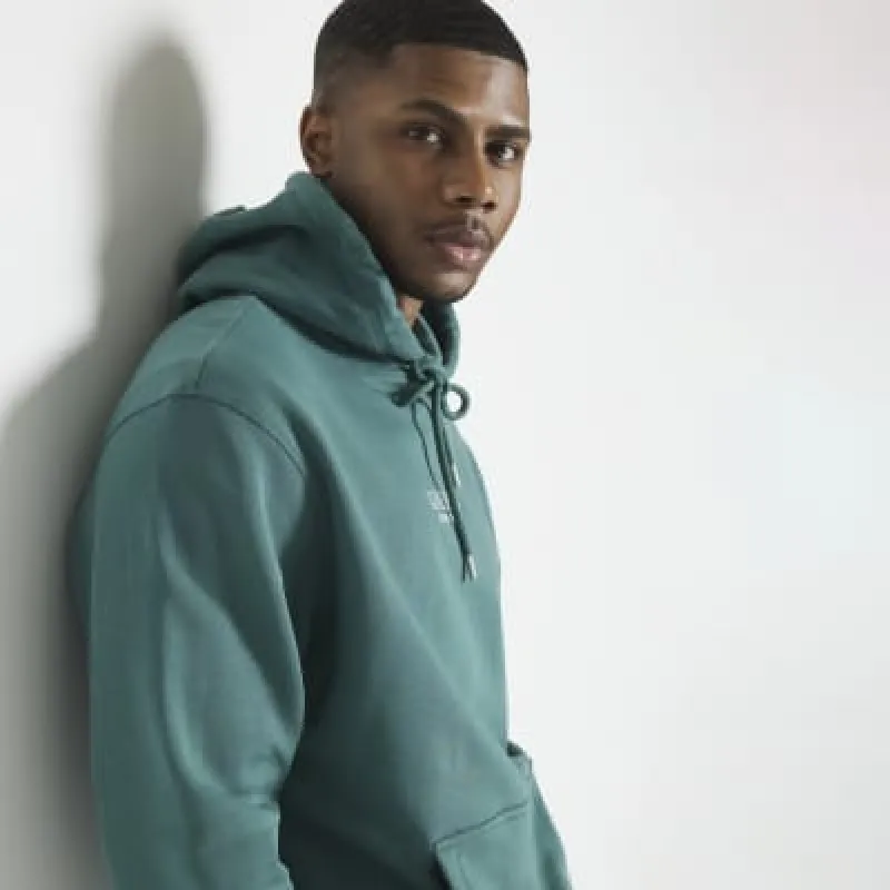 Green regular fit embroidered graphic hoodie sold by River Island