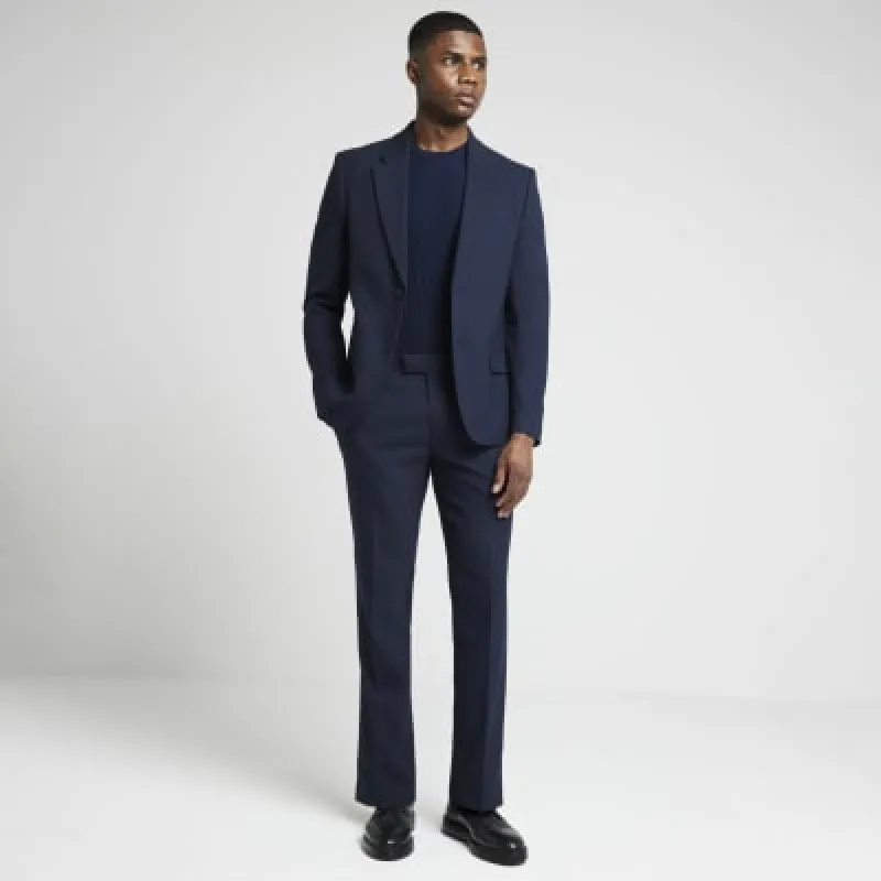 Navy skinny fit suit trousers sold by River Island