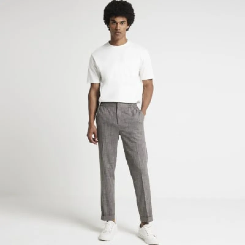 Brown slim fit textured smart trousers sold by River Island