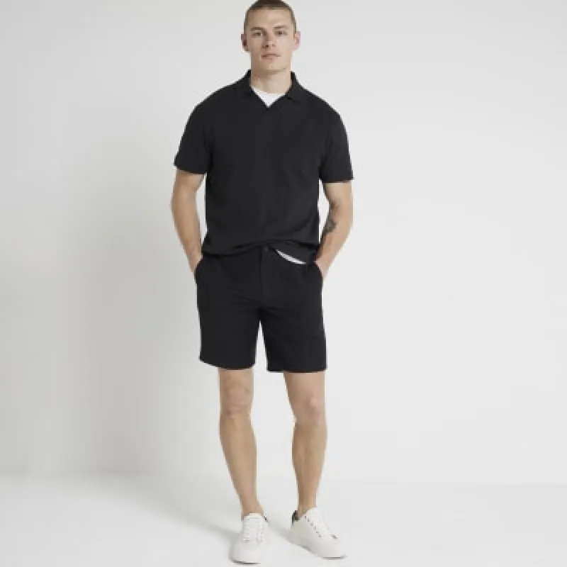 Black regular fit textured open neck polo sold by River Island