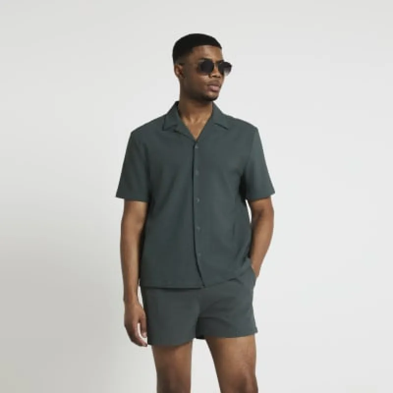 Green regular fit seersucker revere shirt sold by River Island