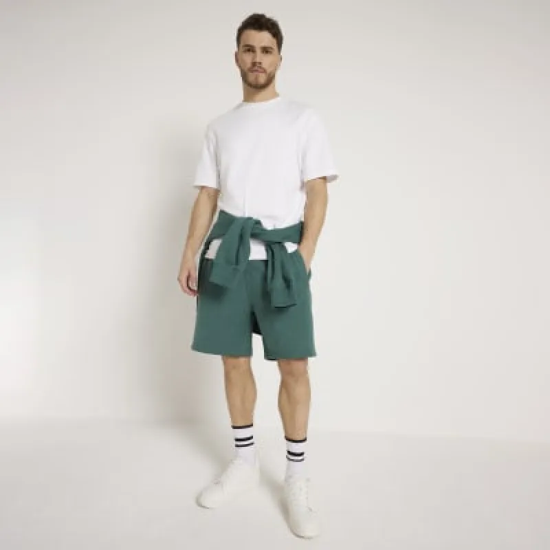 Green regular fit loopback shorts sold by River Island