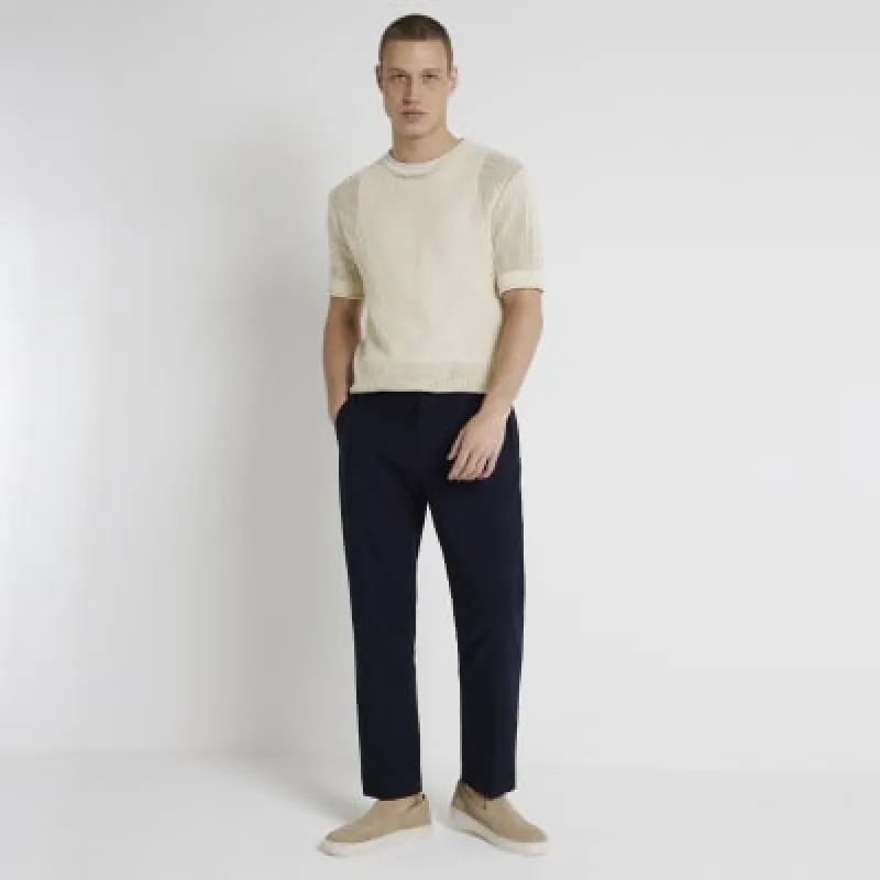 Navy slim fit textured smart trousers sold by River Island