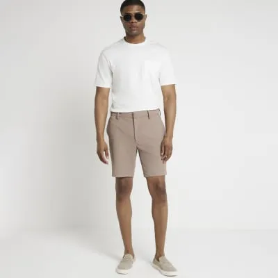 Beige slim fit waffle shorts sold by River Island