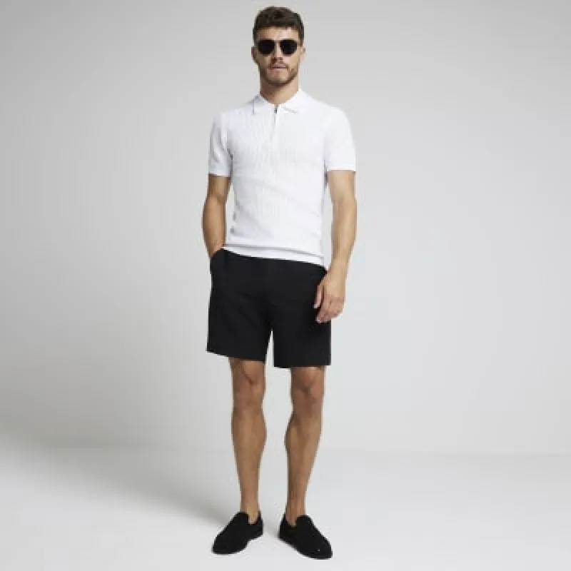 White muscle fit knitted half zip polo sold by River Island