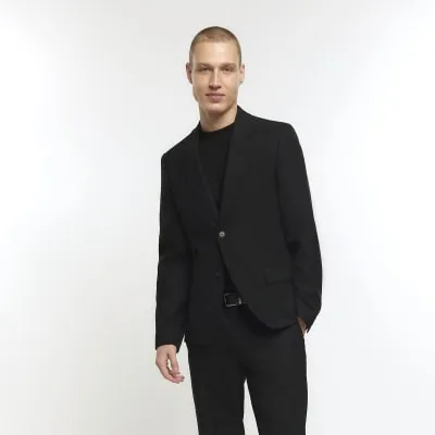 Black skinny fit suit jacket sold by River Island