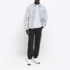 Green regular fit seam cargo trousers sold by River Island