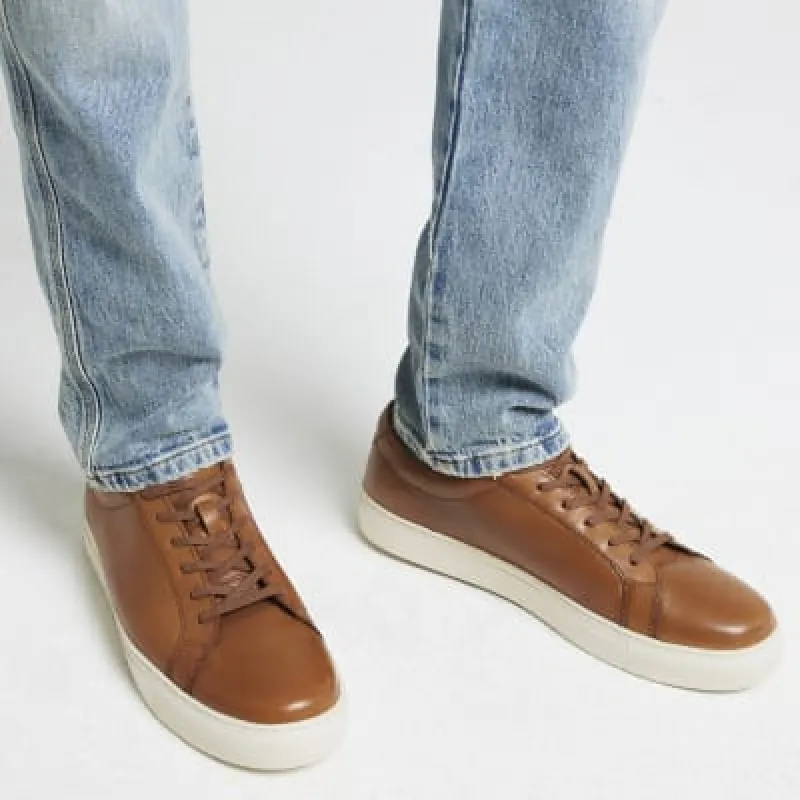 Brown leather lace up trainers sold by River Island