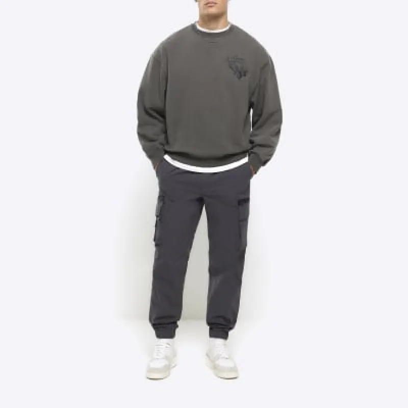 Dark grey regular fit cargo trousers sold by River Island