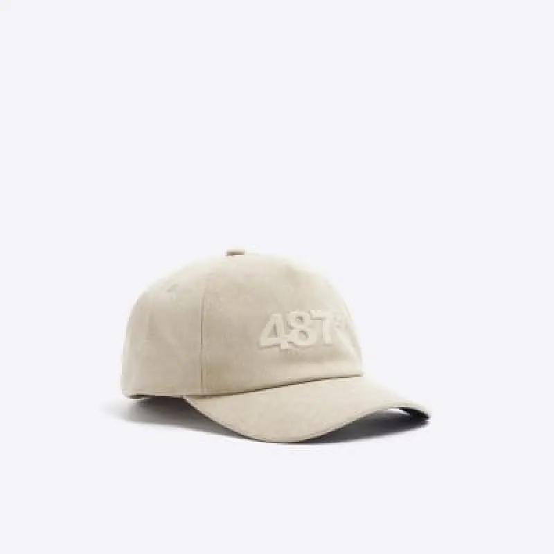 Stone canvas embossed cap sold by River Island
