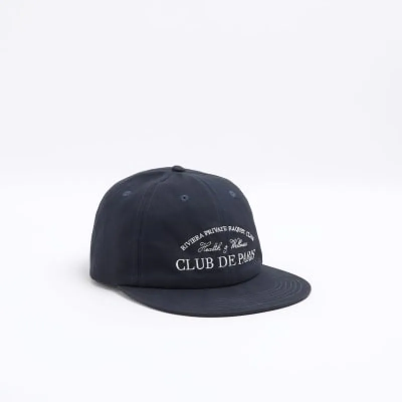 Navy flat peak cap sold by River Island