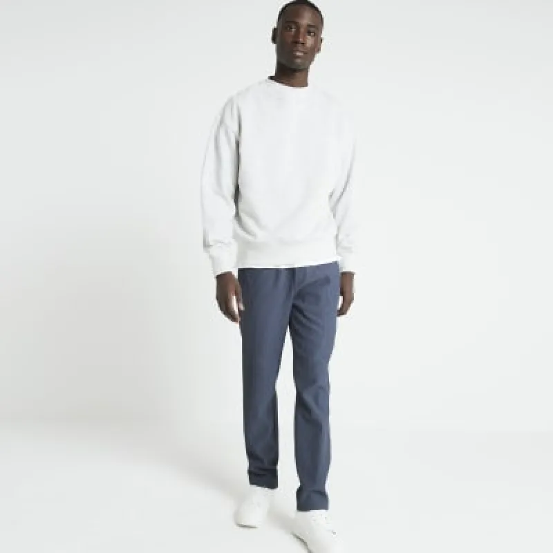 Blue slim fit plisse smart joggers sold by River Island