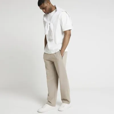 Stone regular fit textured open hem joggers sold by River Island