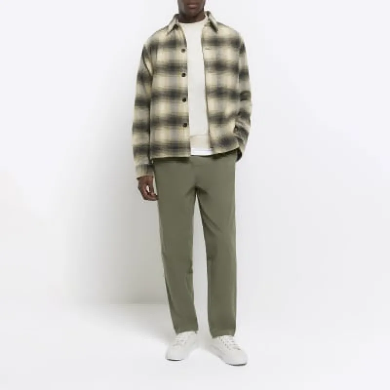 Khaki regular fit pull on trousers sold by River Island
