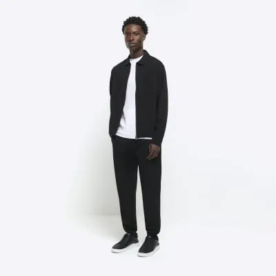 Black slim fit textured smart joggers sold by River Island