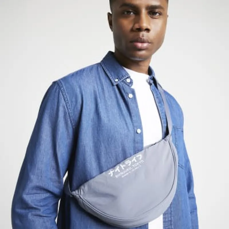 Grey Japanese cross body bag sold by River Island