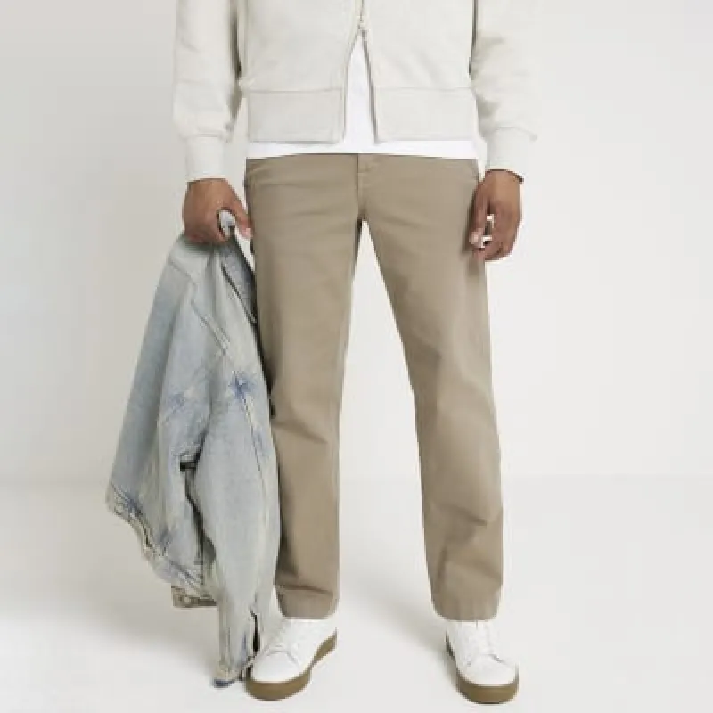 Green regular fit carpenter trousers sold by River Island
