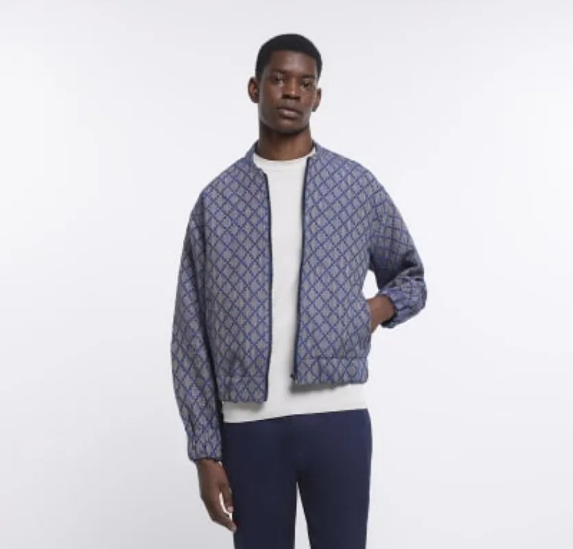 Blue regular fit aztec print bomber jacket sold by River Island