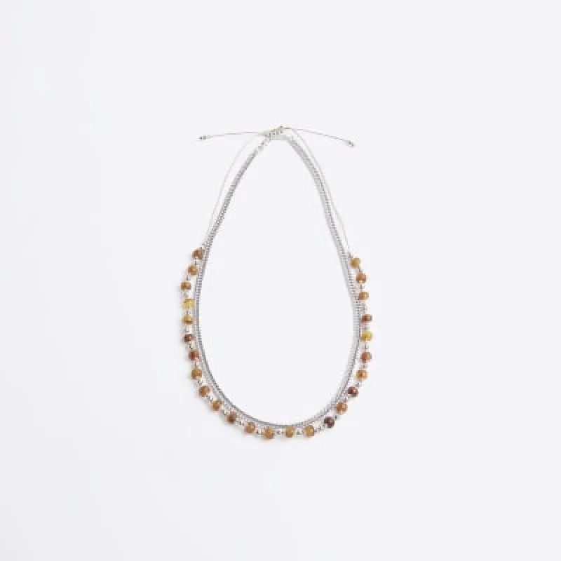 Brown Beaded Necklace sold by River Island