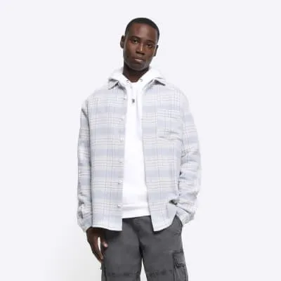 Blue regular fit check long sleeve shirt sold by River Island