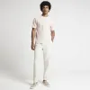 Pink slim fit textured fabric t-shirt sold by River Island