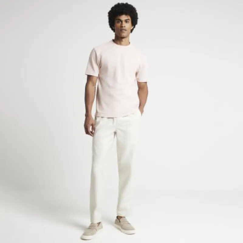 Pink slim fit textured fabric t-shirt sold by River Island