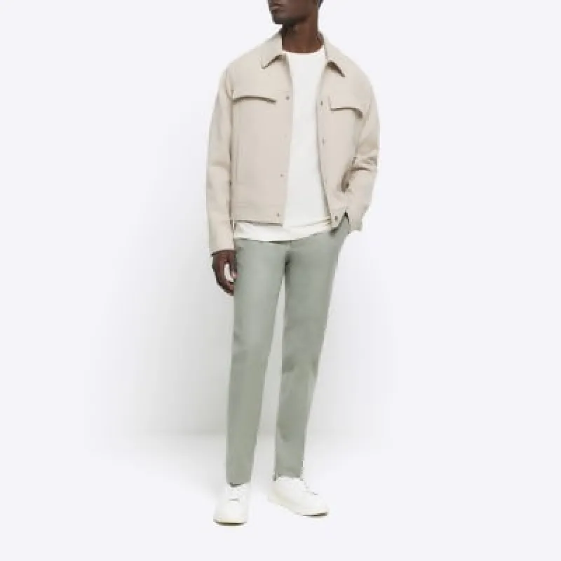 Green slim fit smart chino trousers sold by River Island