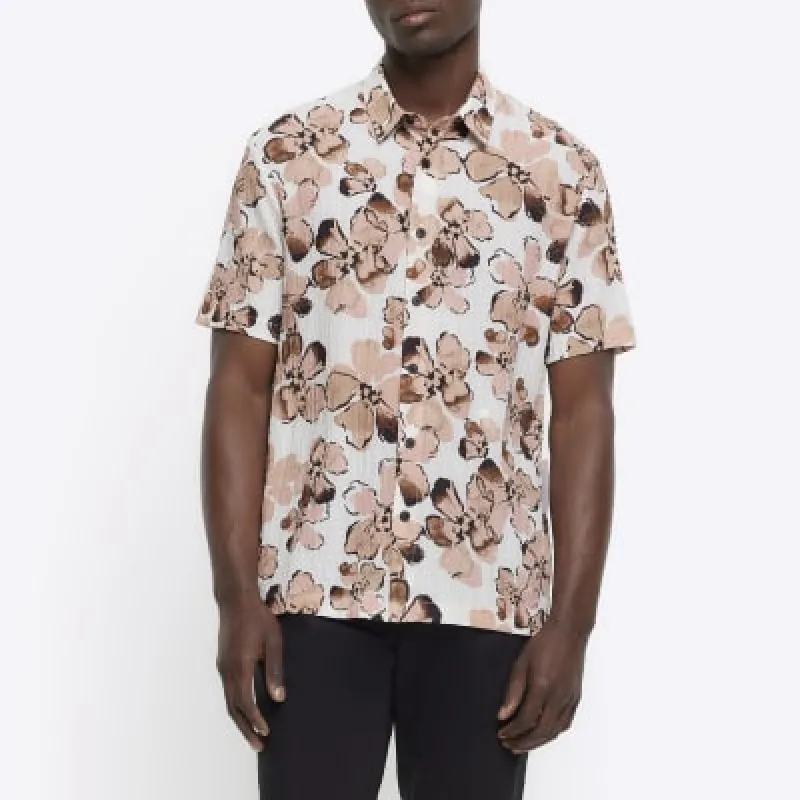 Pink regular fit floral short sleeve shirt sold by River Island