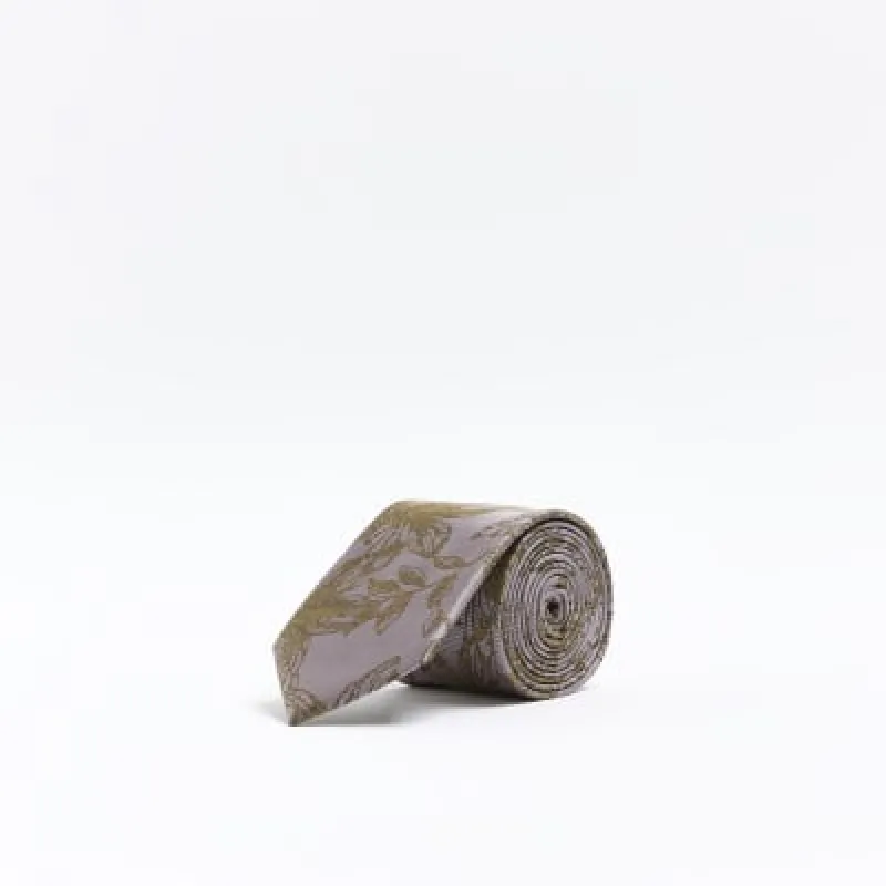 Purple jacquard floral tie sold by River Island