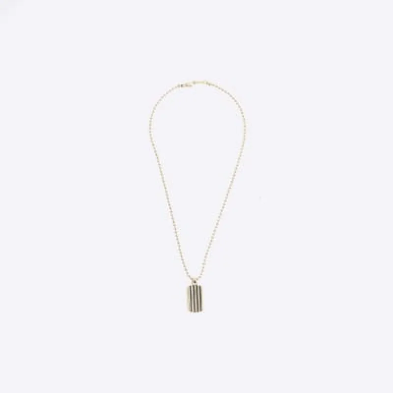 Gold colour tag necklace sold by River Island