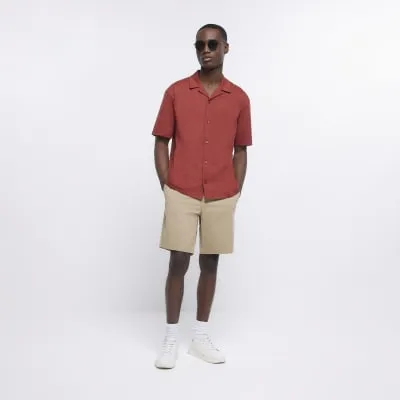 Beige slim fit chino shorts sold by River Island